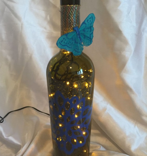 flower lighted wine bottle